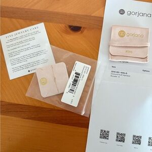 Gorjana Gold Bracelet on Cream Card